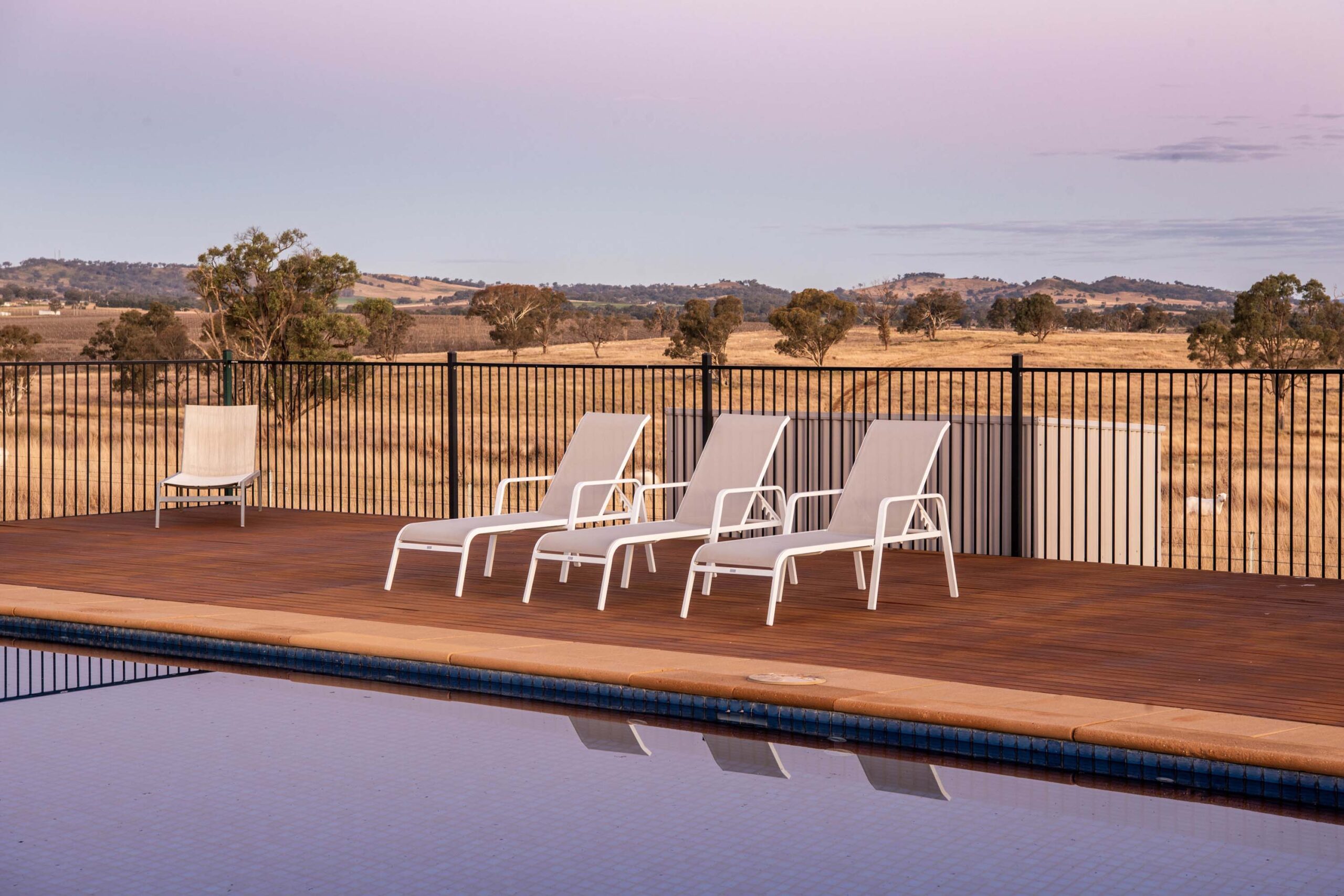 owl head lodge glass studio accommodation gulgong pool sunset